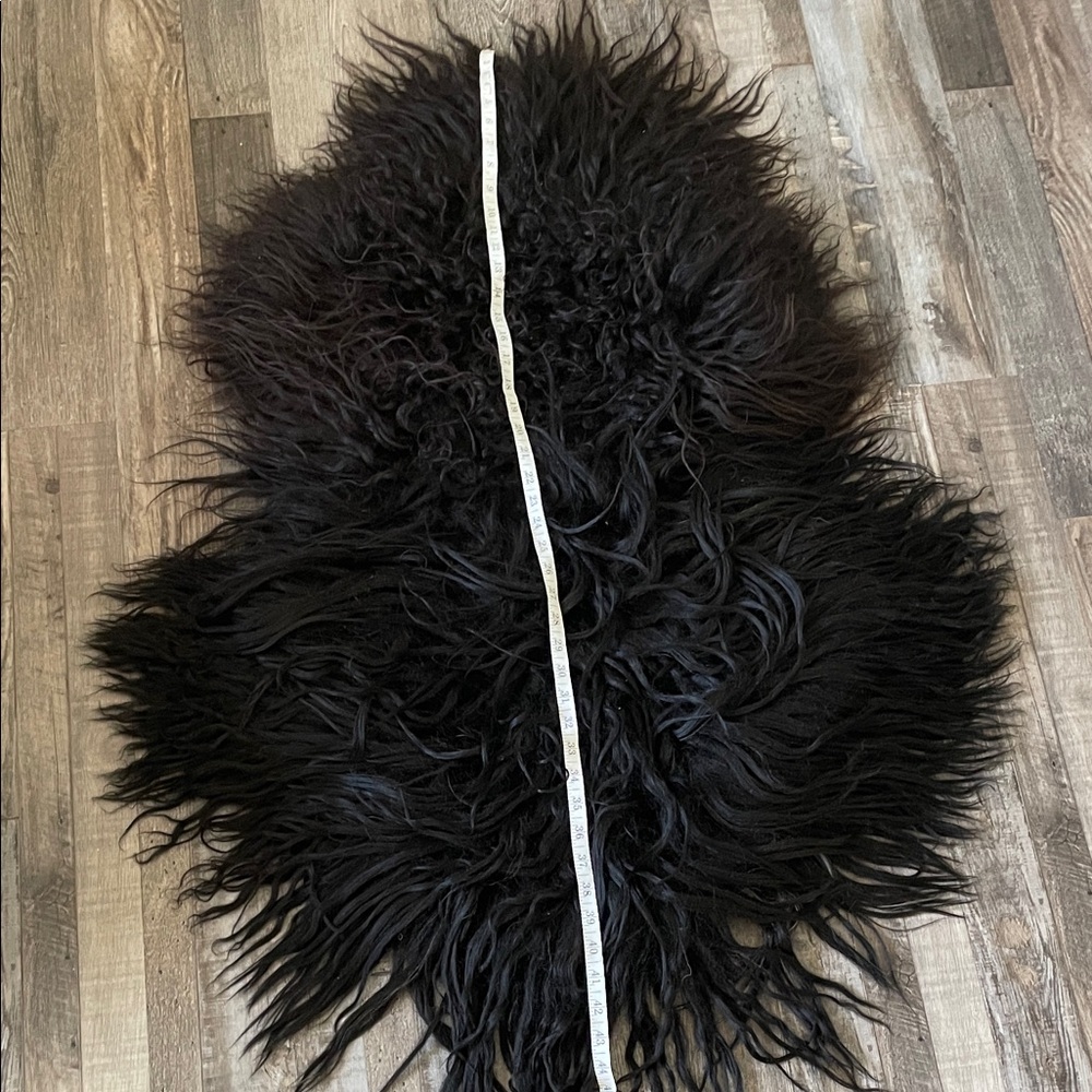 Elegant Black long haired sheepskin Accent Rug